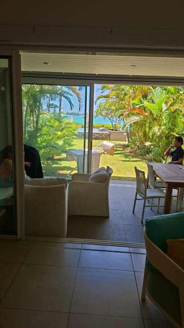 Appartement pieds dans l'eau à Pointe aux Canonniers, 154m², 3 chambres, vue mer, piscine commune