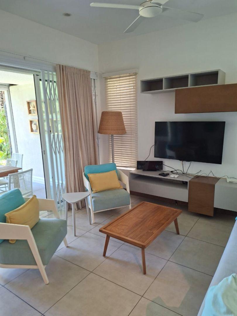 Appartement pieds dans l'eau à Pointe aux Canonniers, 154m², 3 chambres, vue mer, piscine commune