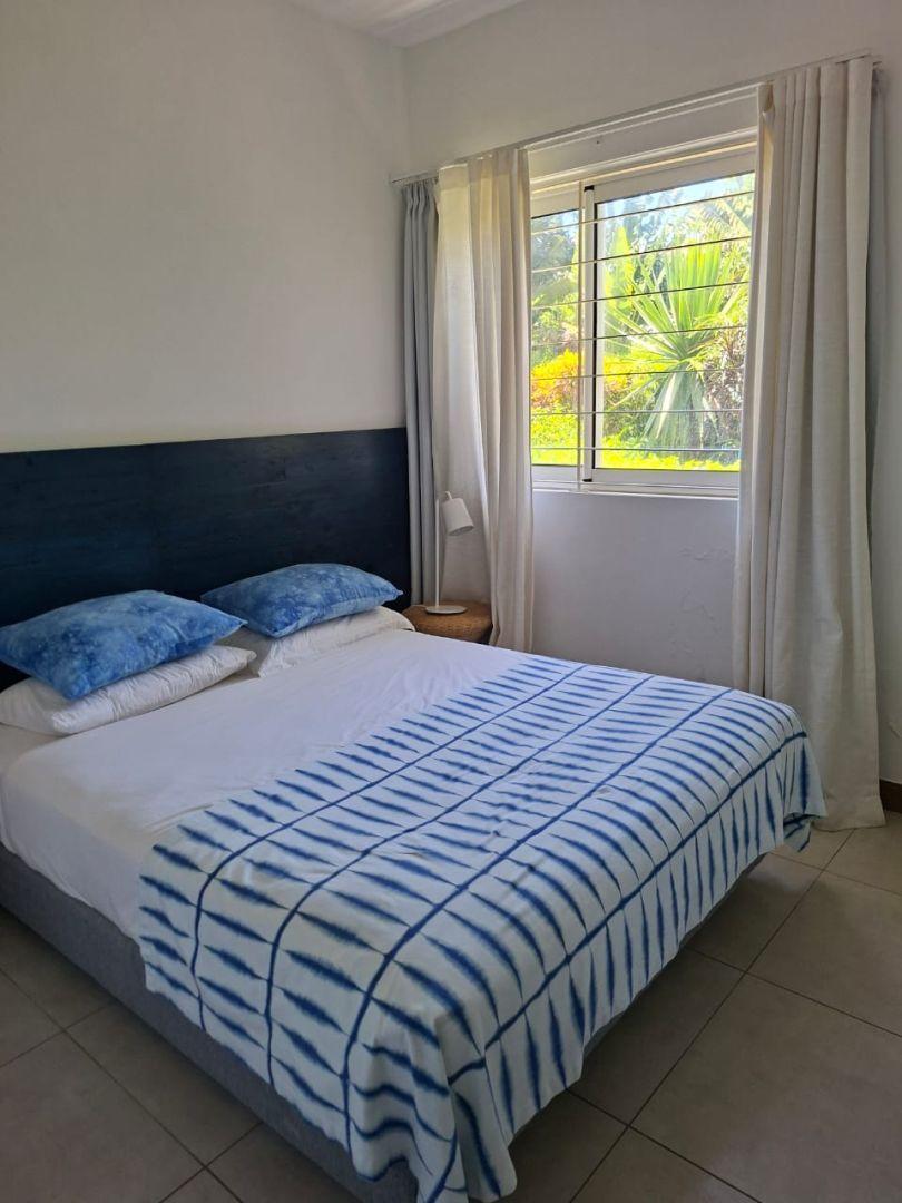 Appartement pieds dans l'eau à Pointe aux Canonniers, 154m², 3 chambres, vue mer, piscine commune