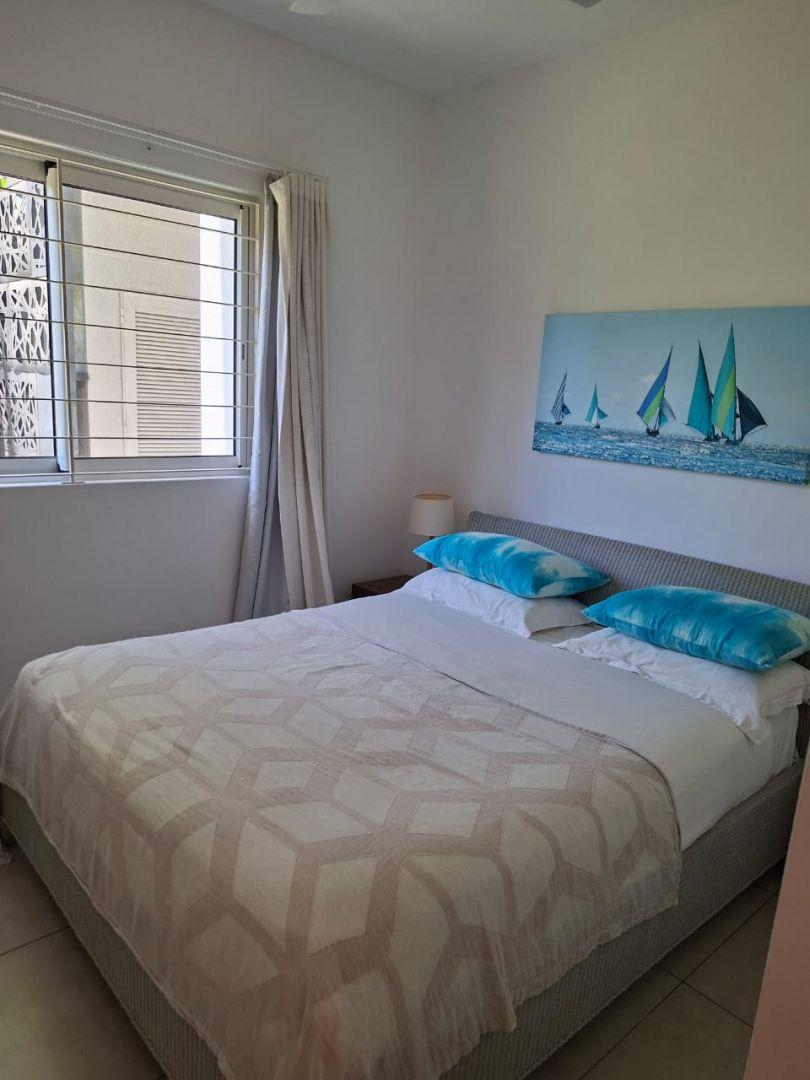 Appartement pieds dans l'eau à Pointe aux Canonniers, 154m², 3 chambres, vue mer, piscine commune