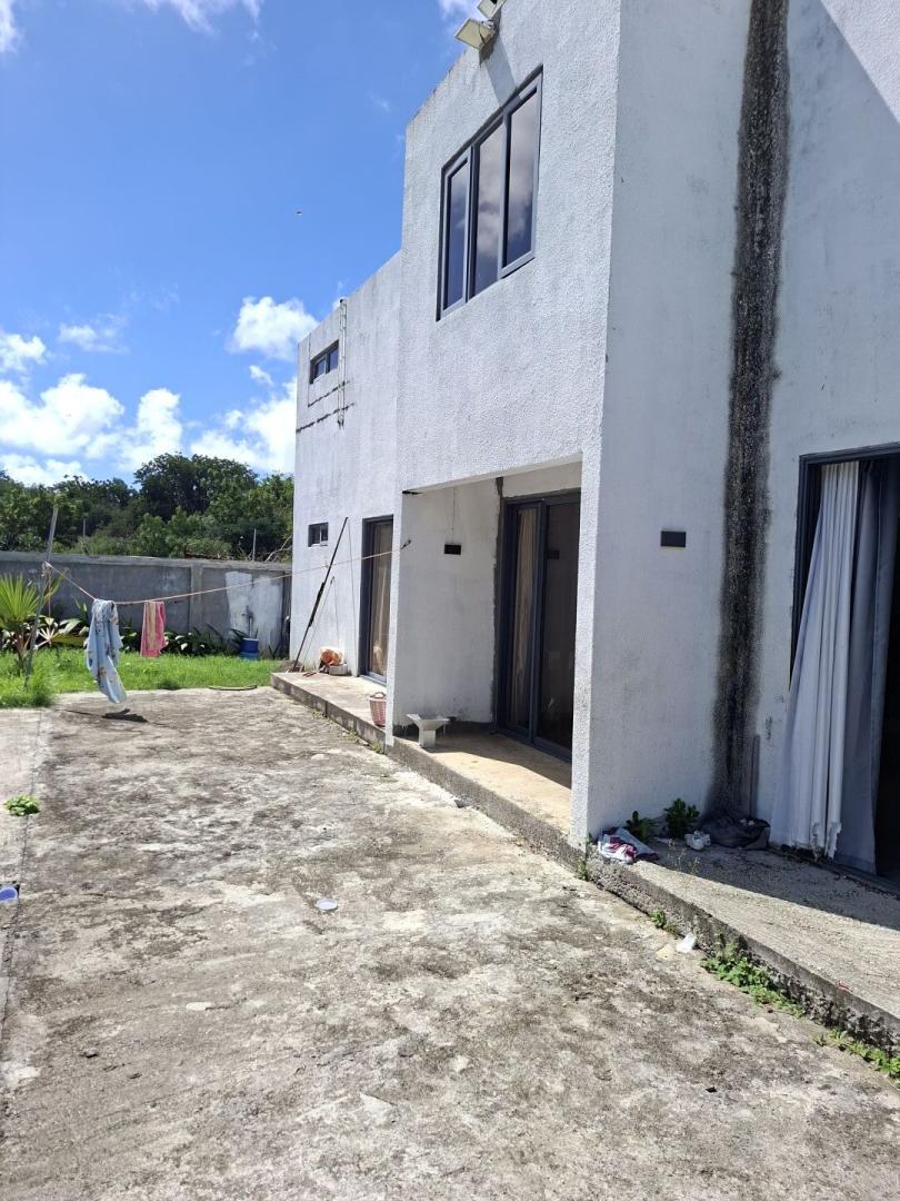 Maison à vendre à Calodyne – Propriété spacieuse de 3 chambres avec fort potentiel