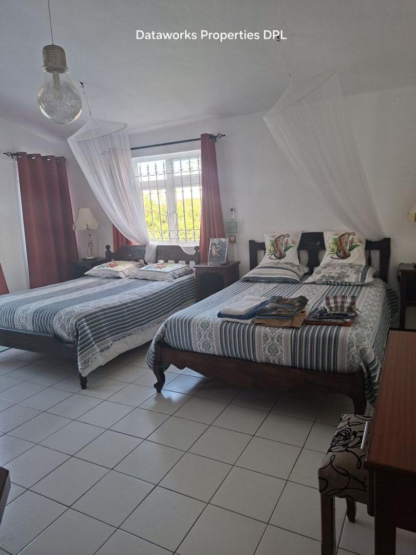 Villa à vendre à Flic en Flac – Grande villa familiale avec piscine, 4 chambres et garage 2 voitures
