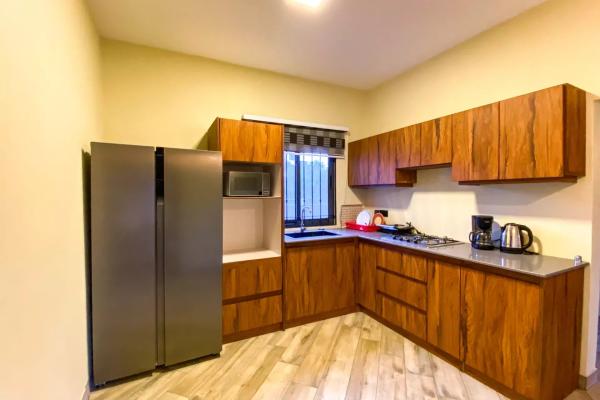 Trou aux Biches - À louer appartement neuf de 2 chambres en rez-de-chaussée avec piscine - photo 5