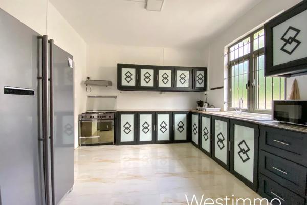 TROU AUX BICHES - Location long terme grand appartement en rez-de-chaussée proche plage - photo 5