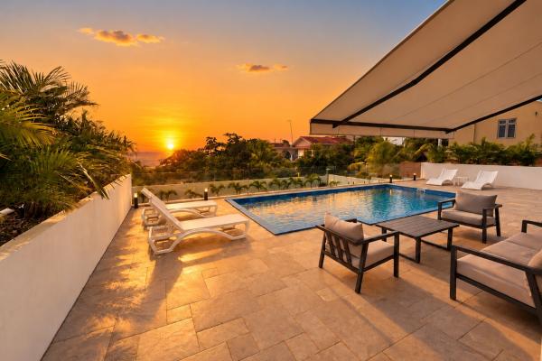 Brand new modern 4-bedroom villa with pool and sea view for rent in Flic en Flac - photo 1