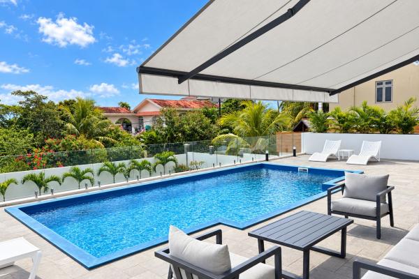 Brand new modern 4-bedroom villa with pool and sea view for rent in Flic en Flac - photo 4